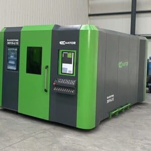 Large industrial machine with green and gray exterior.